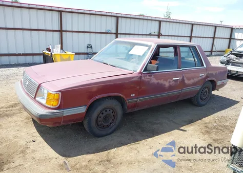 1989 Plymouth Reliant Le z USA, uszkodzony, nr VIN 3P3BK46DXKT973073